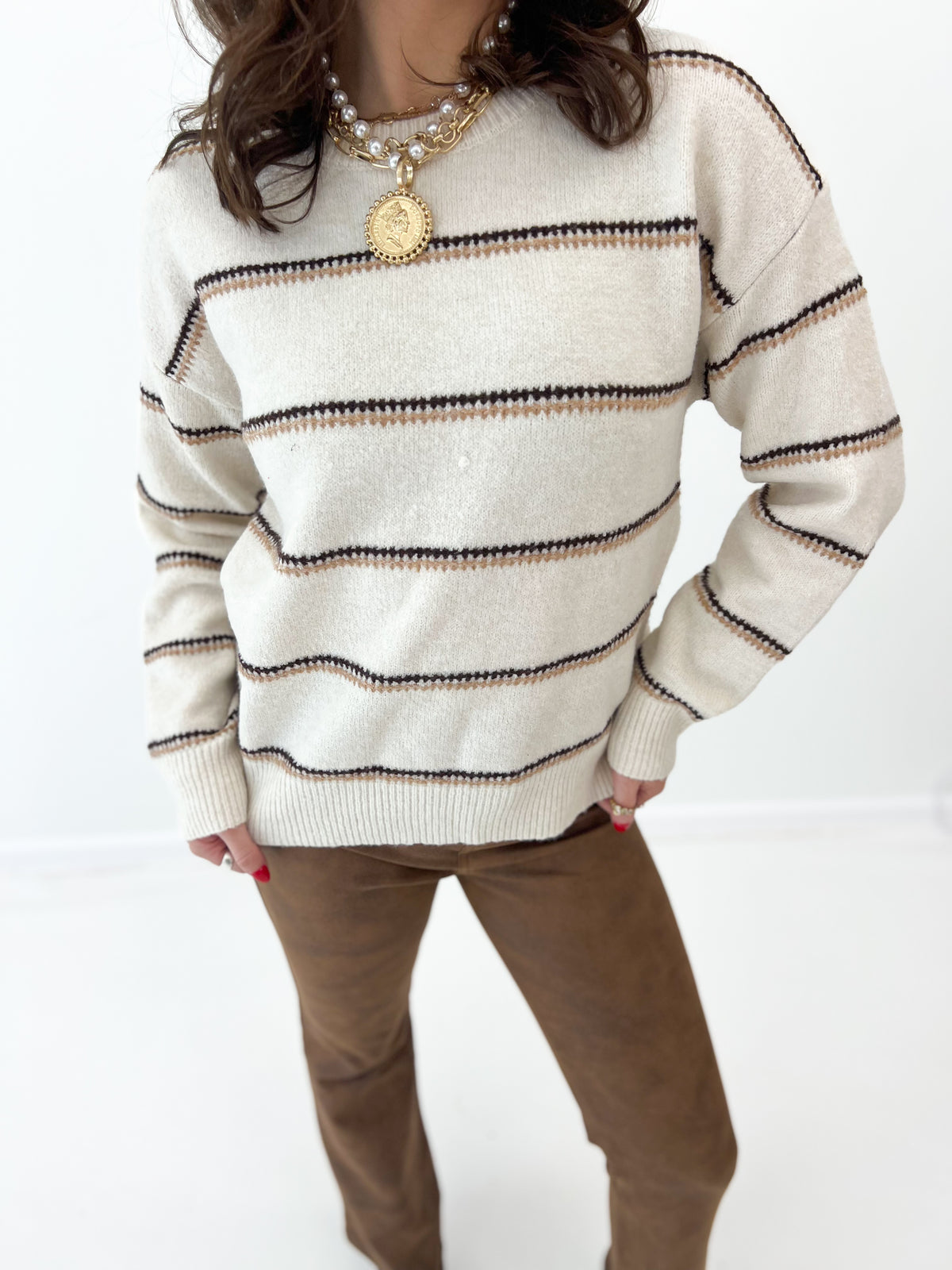 Oatmeal knit stripe sweater with crew neck, long sleeves, ribbed trim