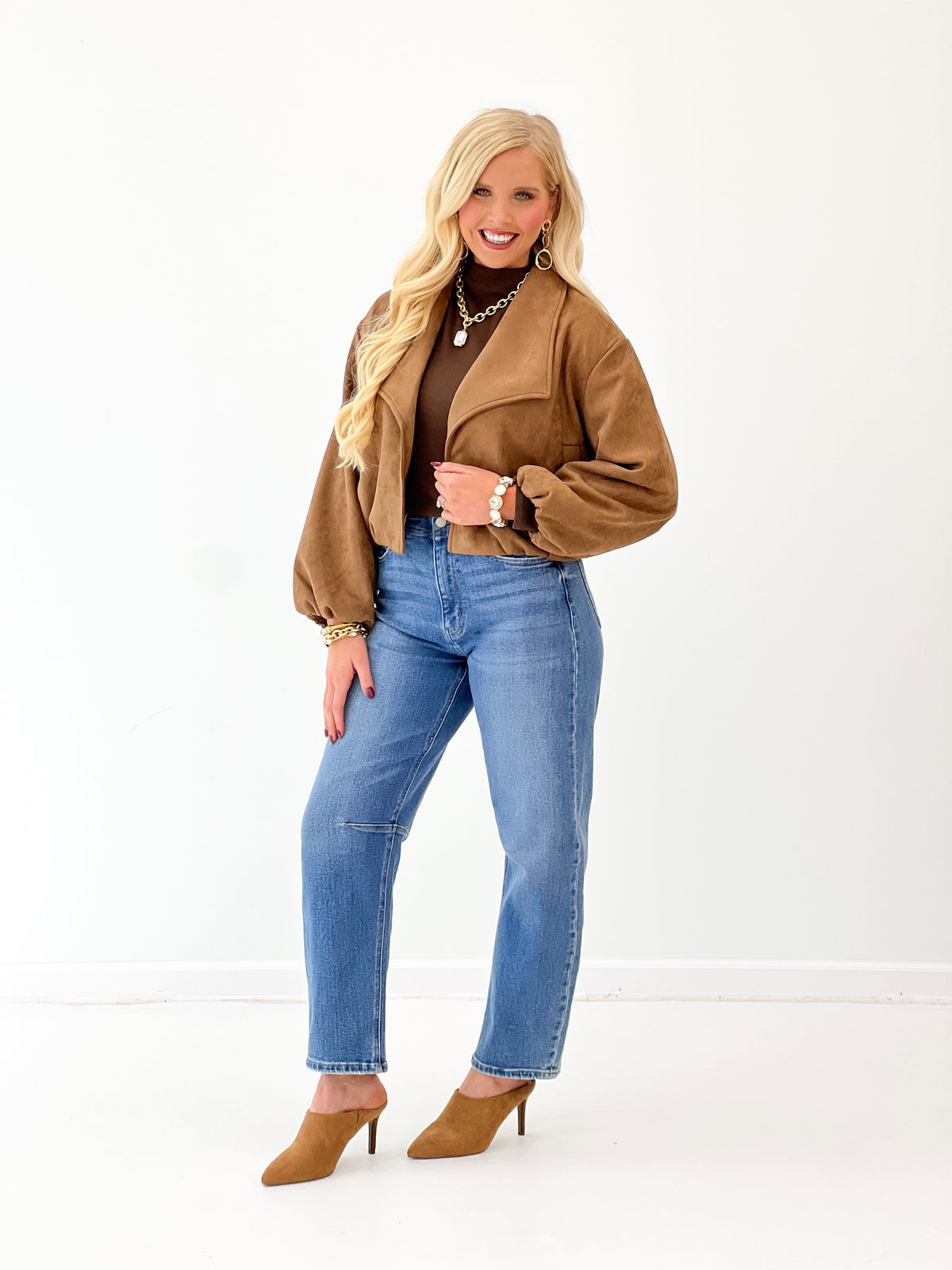 Camel soft suede open-lapel bubble jacket with long sleeves and front pockets