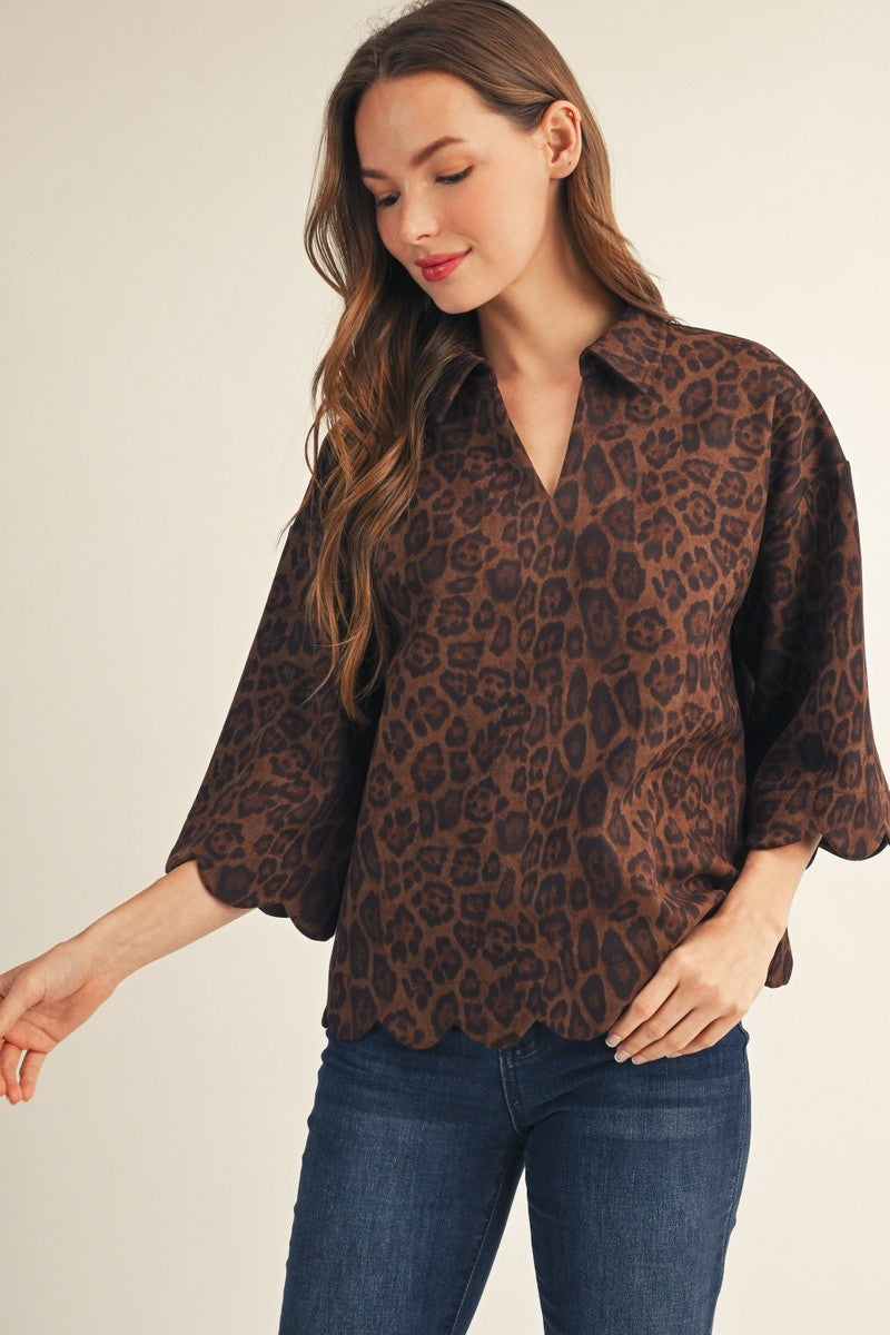 Leopard-print suede button-up top with scalloped hem and three-quarter sleeves (front view)
