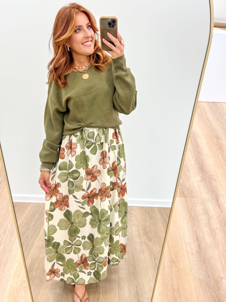 Olive long-sleeve knot-front top with green brown floral midi skirt outfit
