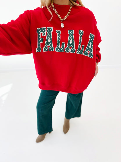 Red mock-neck sweatshirt with teal polka-dot applique 'FALALA' graphic