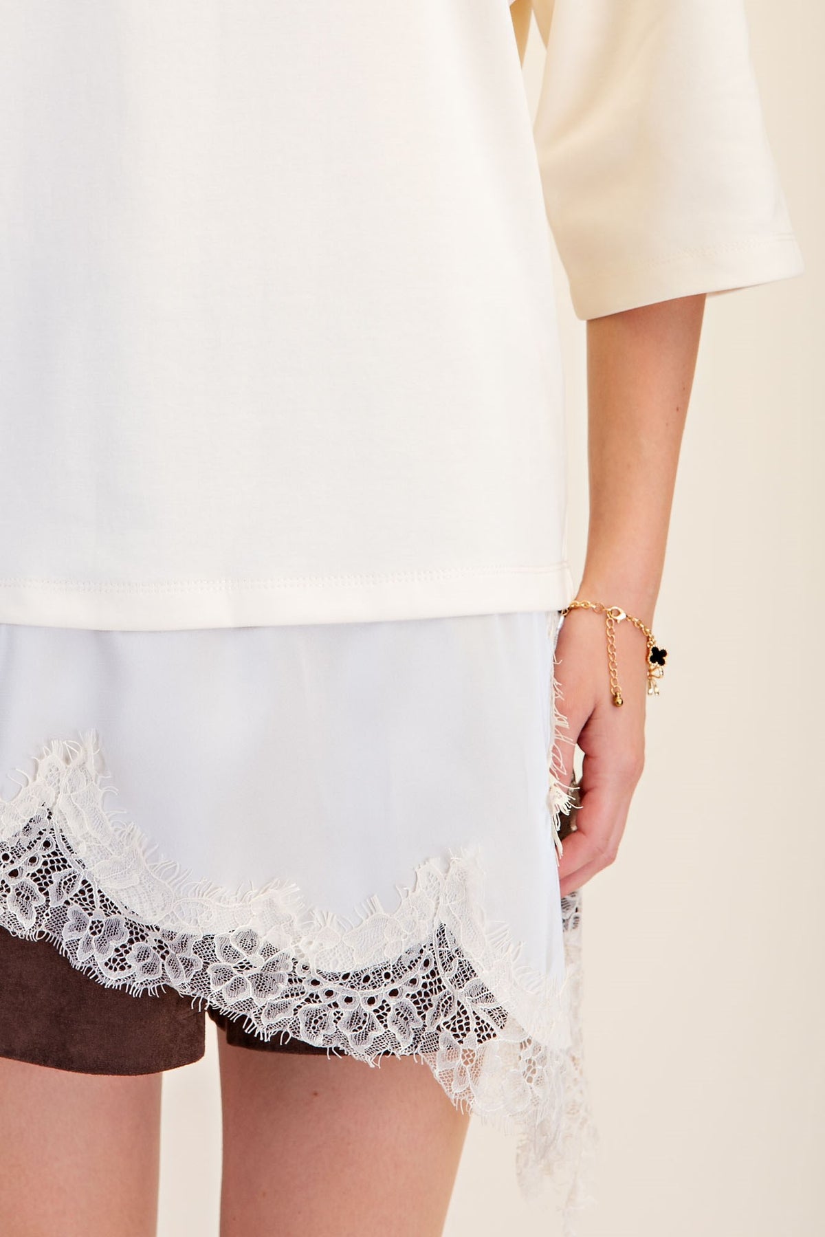 Glam Asymmetric Lace Trim Top in Ivory