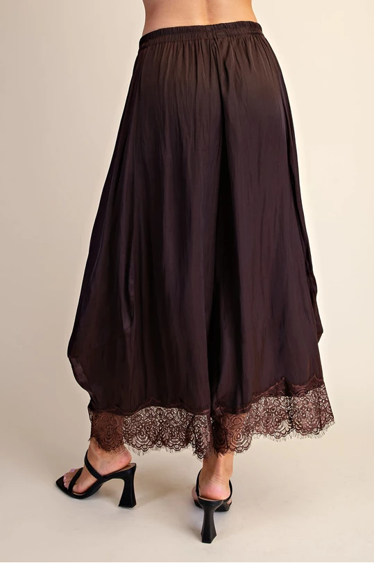 Brown cropped wide leg pants with lace hem, back view