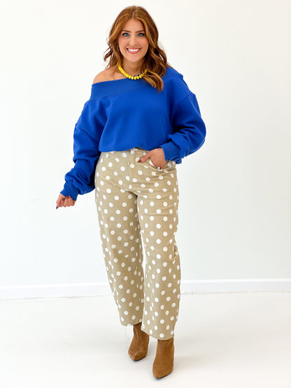 Taupe high-rise straight-leg polka dot pants with white dots, front view