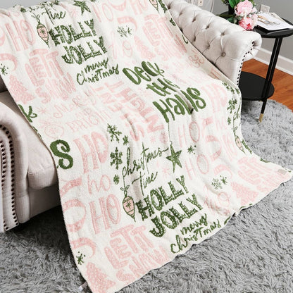 Cream throw blanket with pink and green Holly Jolly print