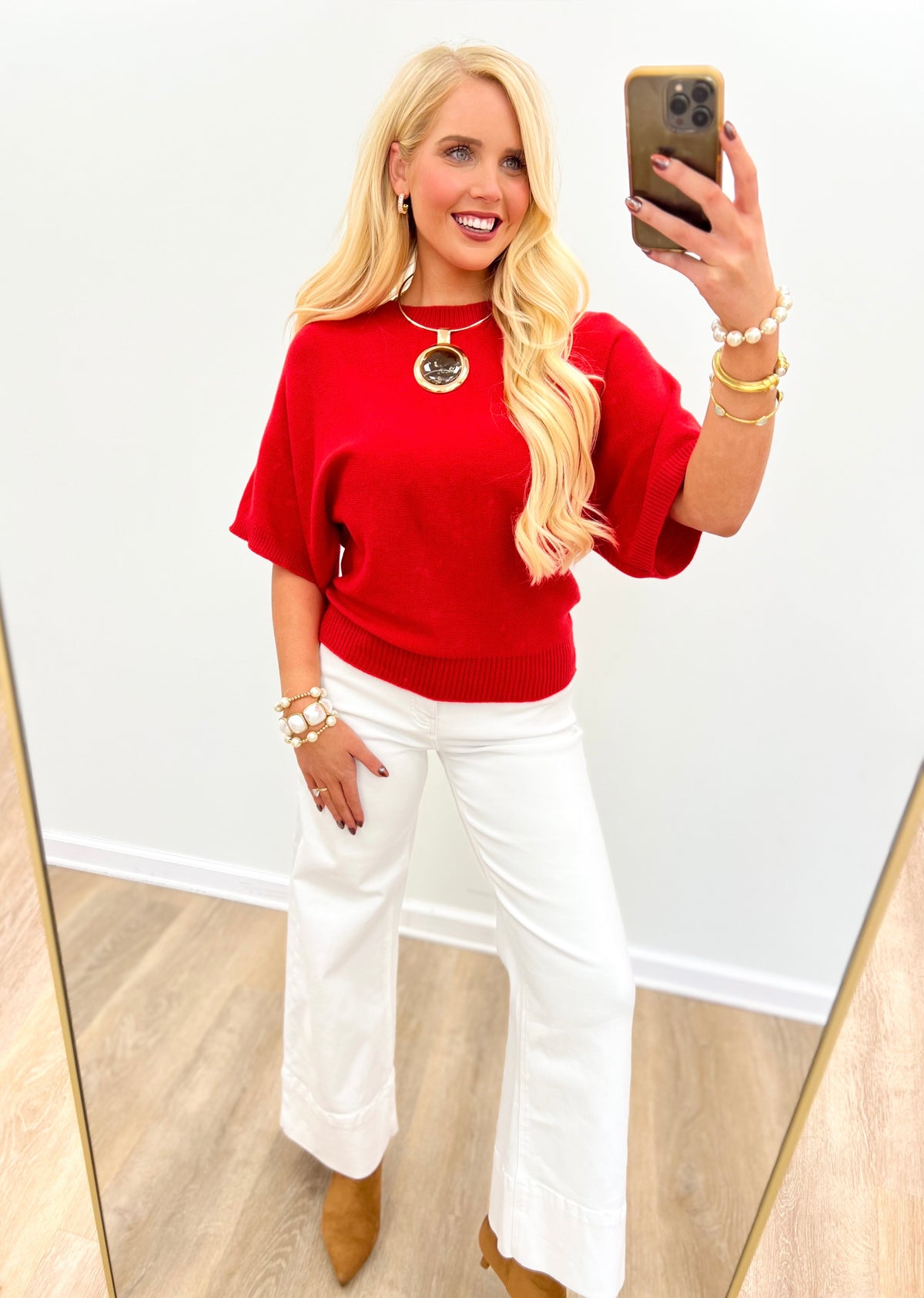 Red dolman elbow-sleeve sweater with crew neckline and ribbed knit waist hem