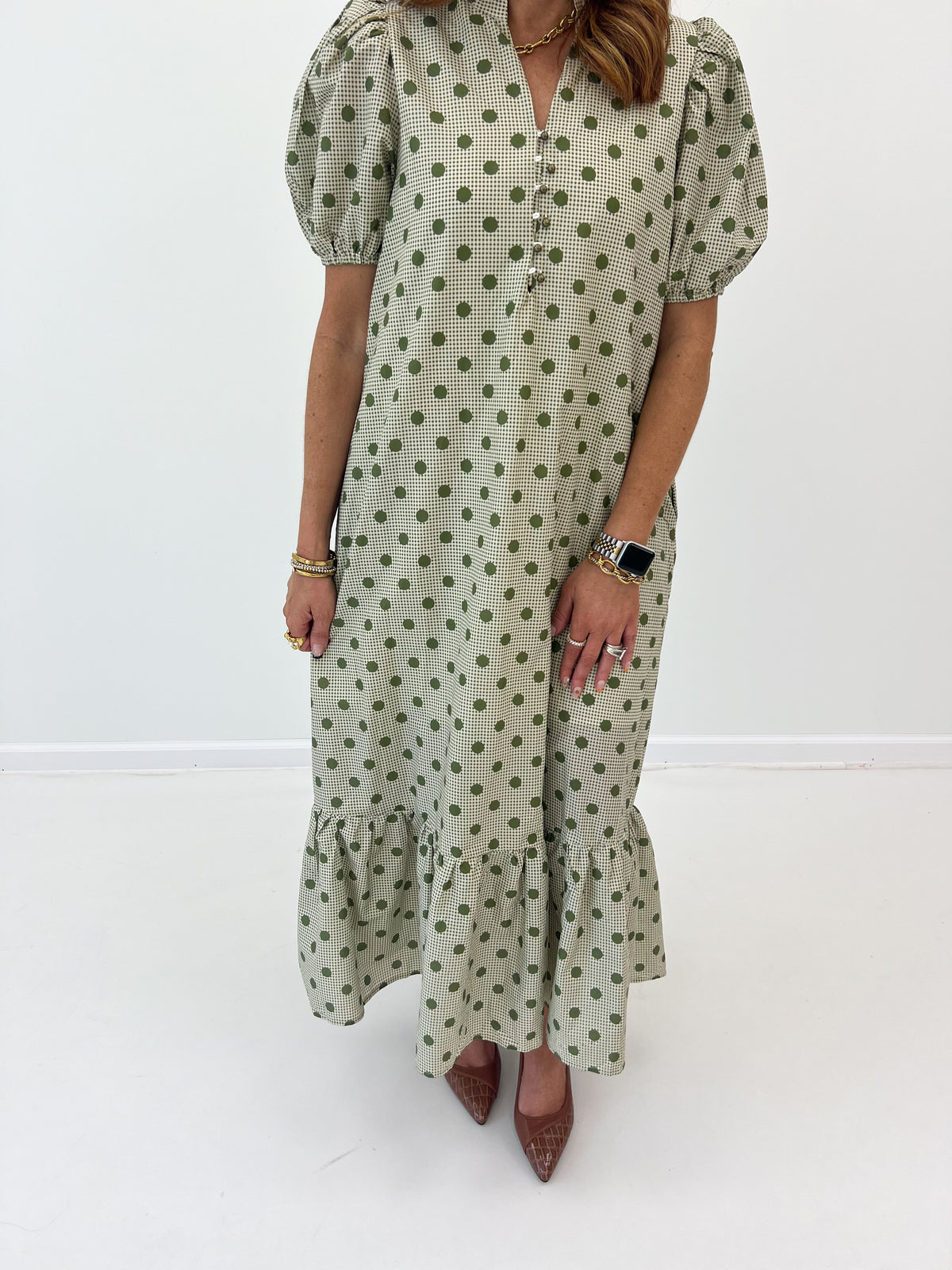 Olive polka dot V-neck maxi dress with puff sleeves and tiered ruffle hem