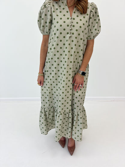 Olive polka dot V-neck maxi dress with puff sleeves and tiered ruffle hem
