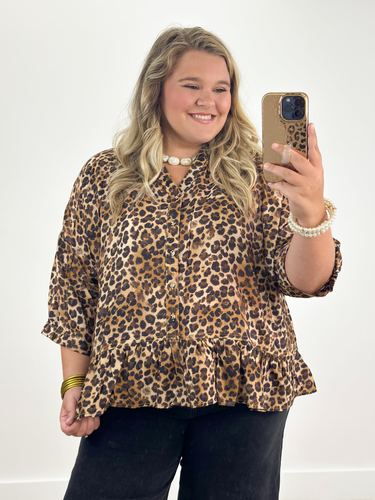 Curvy leopard print button-down top with frilled hem and short sleeves, front buttons