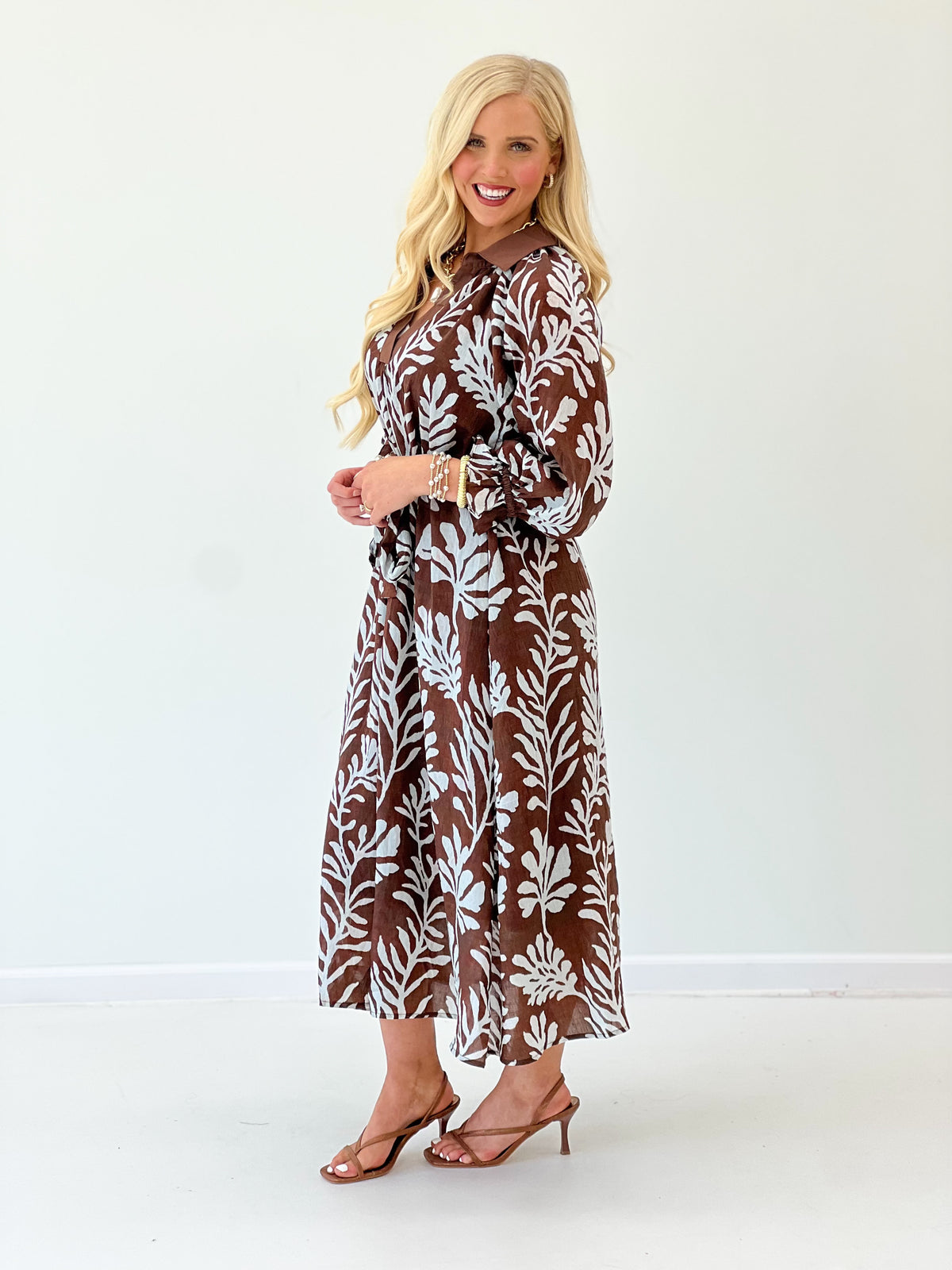 Umgee V-neck collared midi dress in dark brown leaf print, long sleeves, tied waist