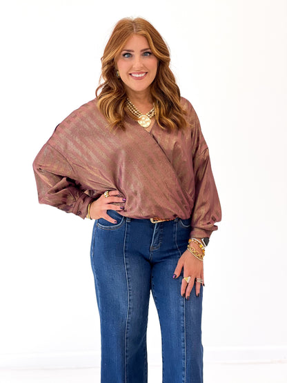 Burgundy metallic stripe V-neck wrap blouse with billowy sleeves and ruched waist detail