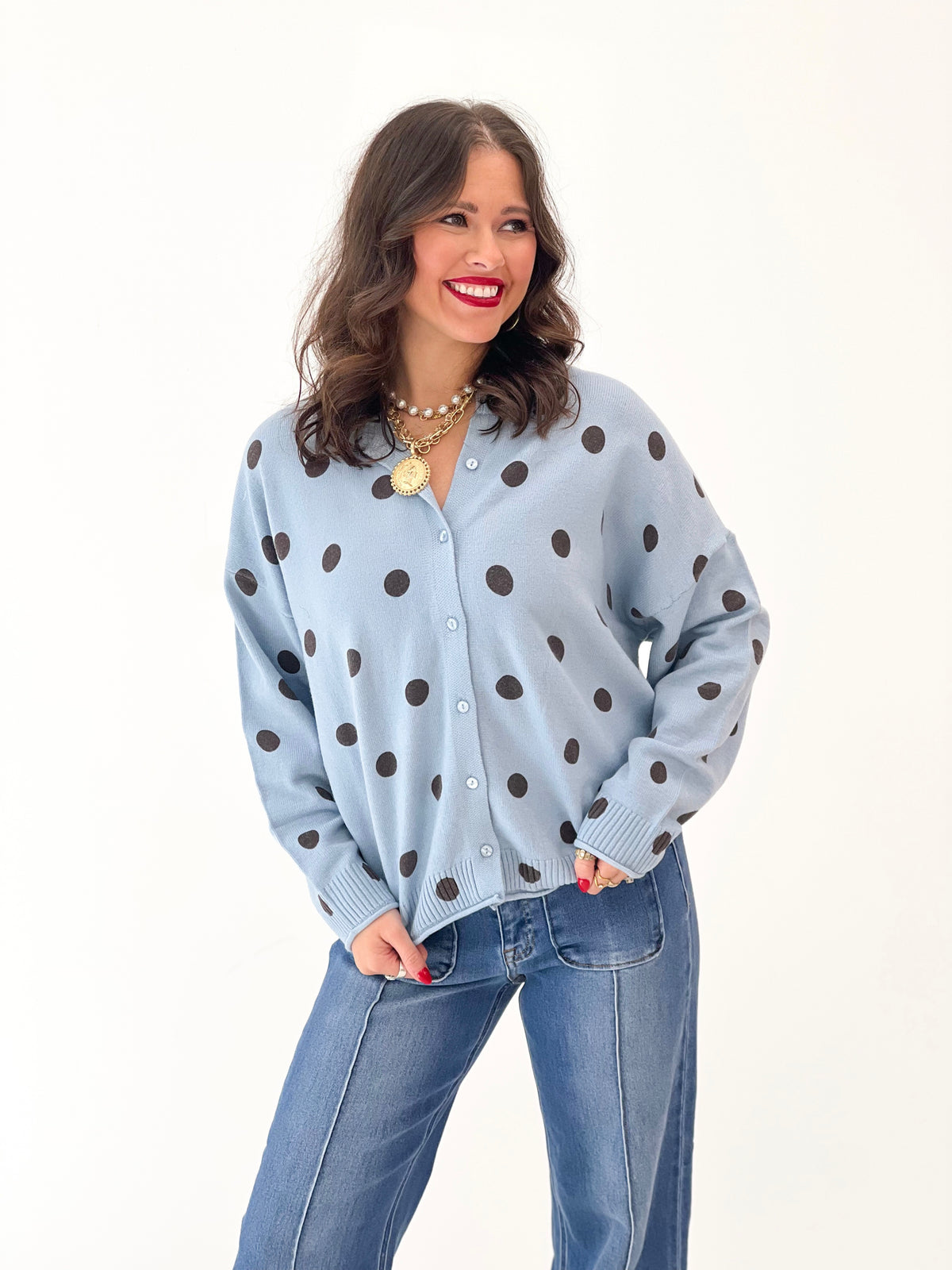 Polka dot knit cardigan, light blue with long sleeves and button-front closure