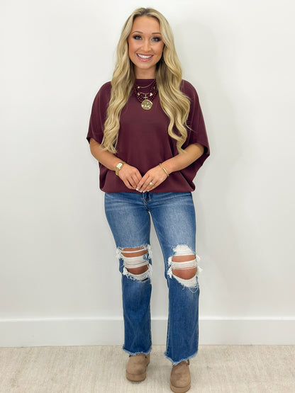 Wine scuba dolman top, short sleeves with roomy fit and crew neckline