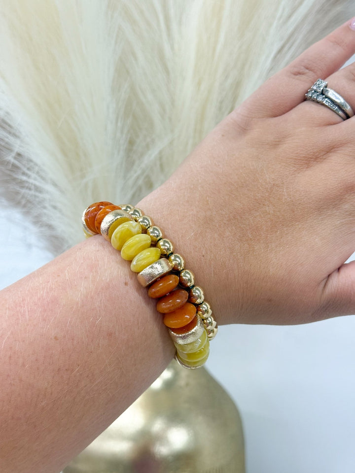 Two-row bracelet of colored rondelle beads