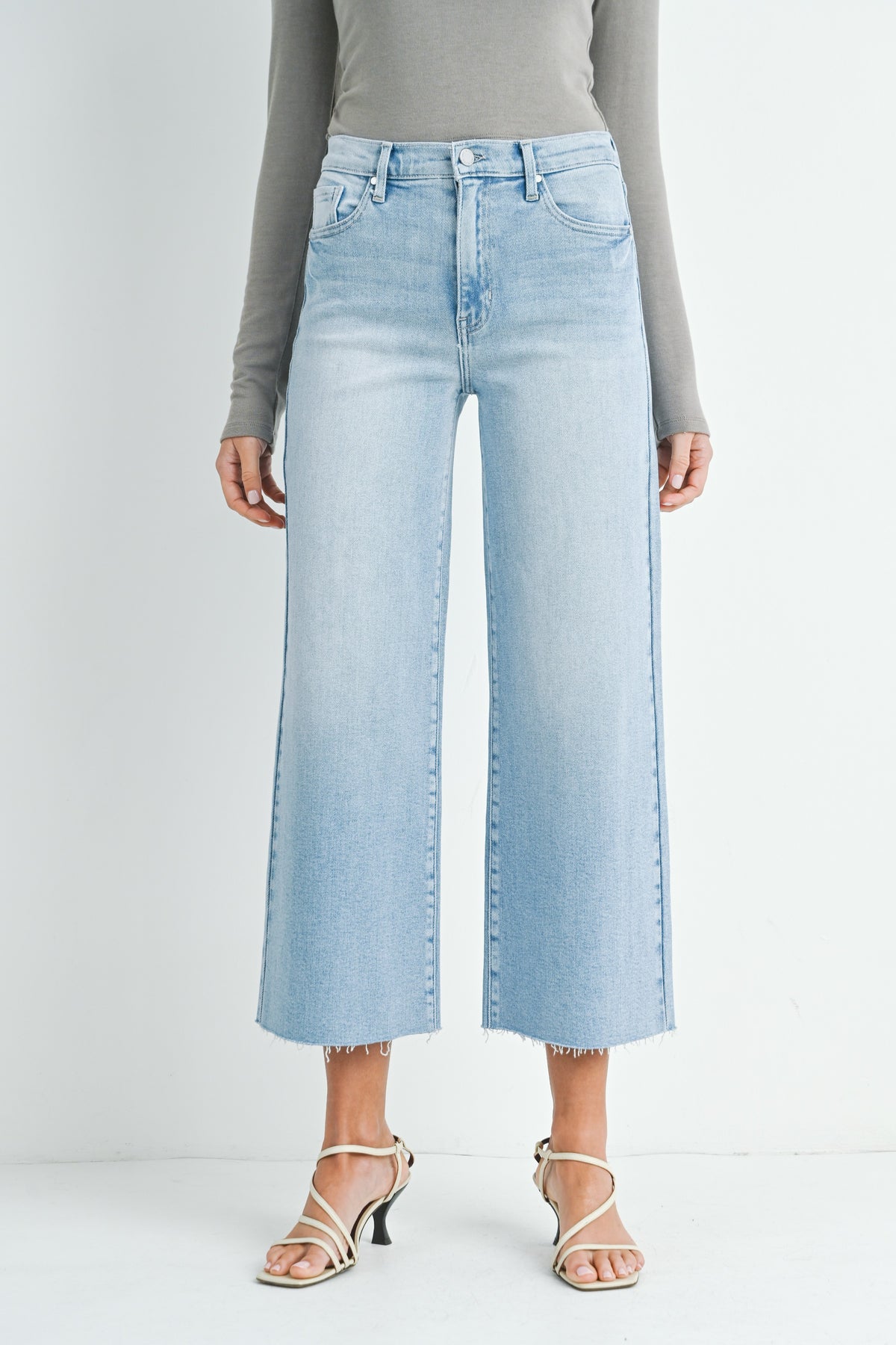 Light denim wash wide leg jeans with a high rise waist