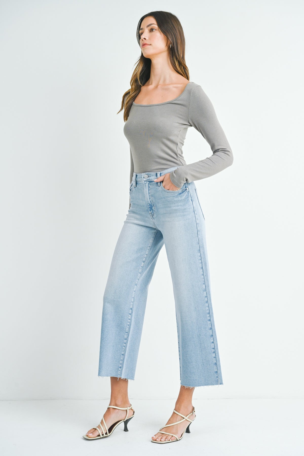 Light wash high rise wide leg jeans with a subtle flare