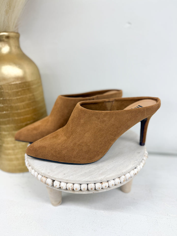 Camel suede slip-on mule with pointed toe, kitten heel, and beaded sole