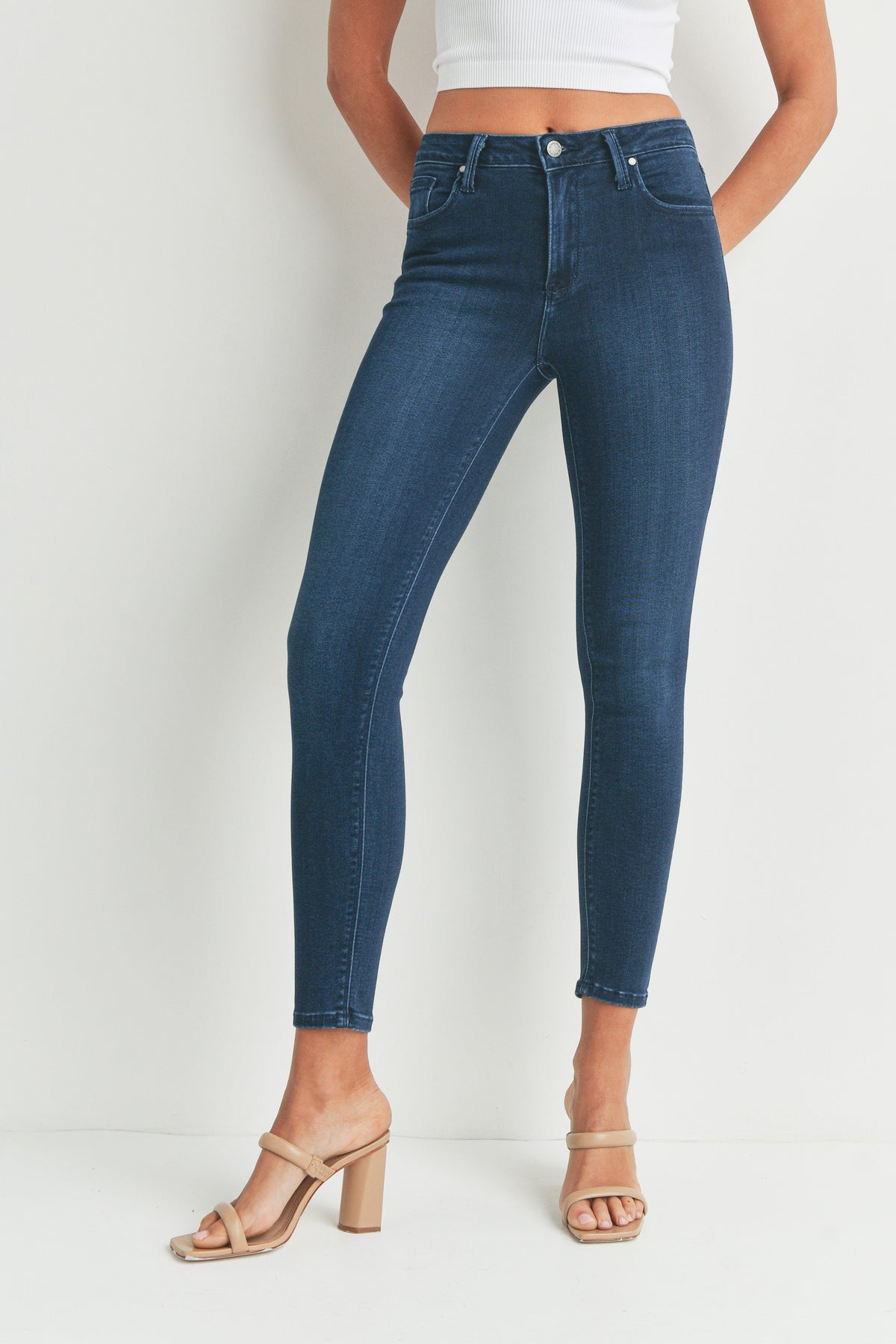 Dark denim high rise ankle skinny jeans