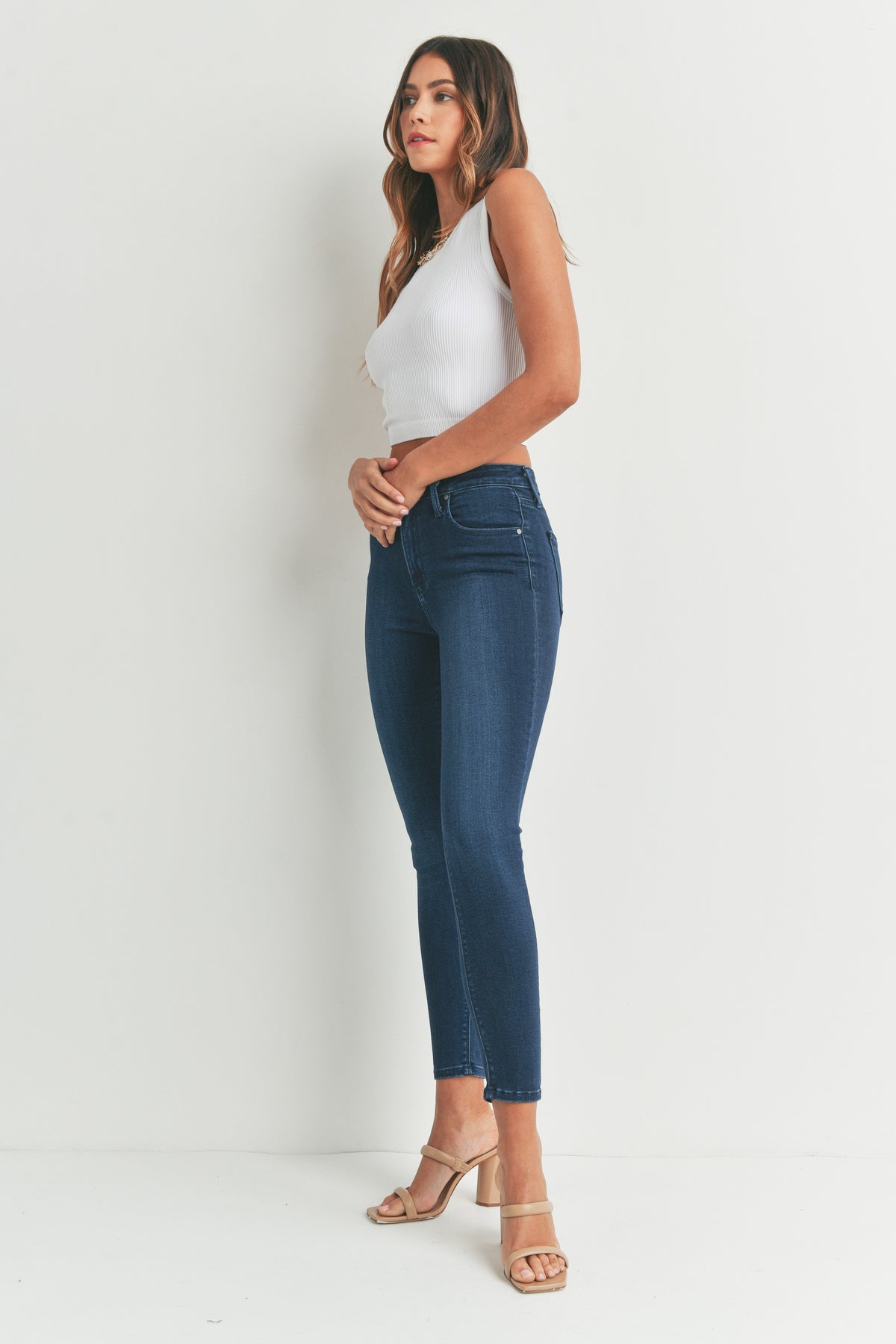 Dark wash skinny jeans with an ankle length hem