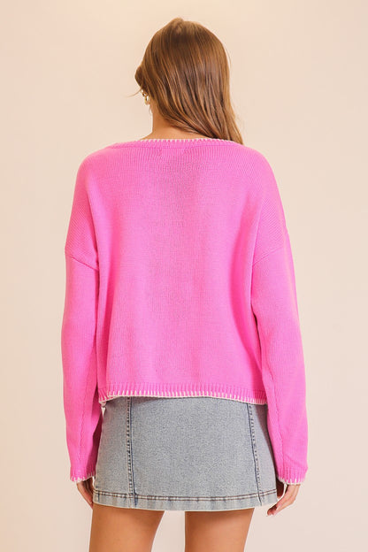 Timing Merry Festive And Chic Holiday Sweater in Pink, MERRY lettering