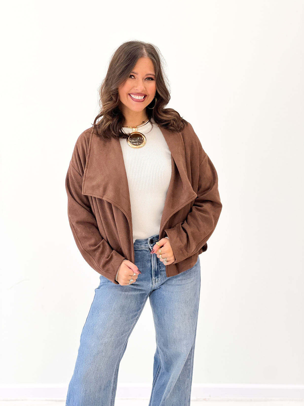Brown suede collared jacket with chest pockets and open front