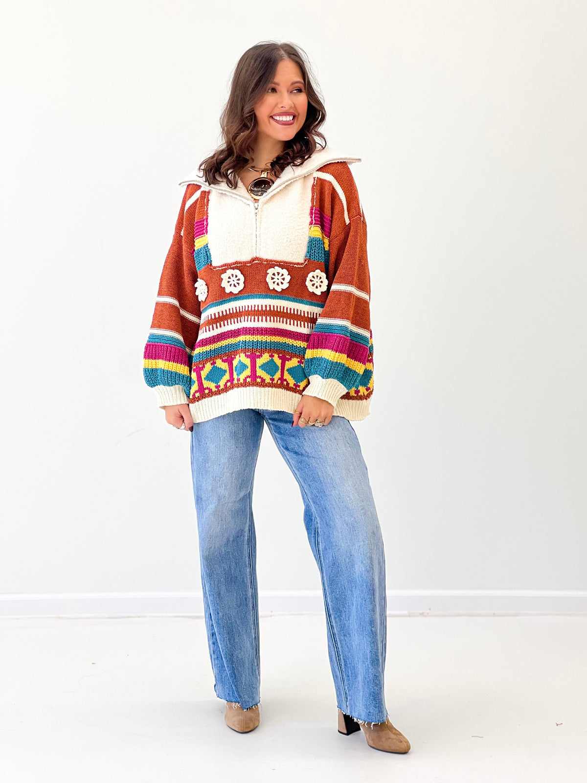Half-zip hooded sweater in brick and multi stripes, front pocket detail and knit trim