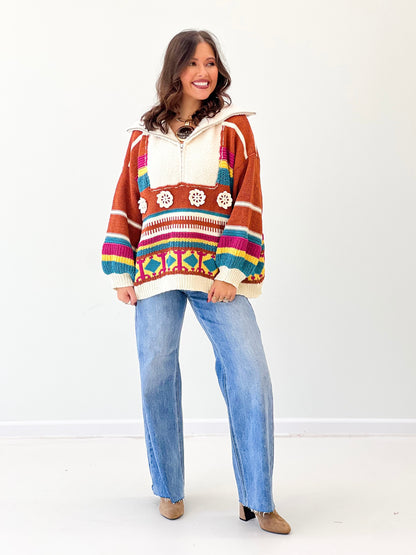 Half-zip hooded sweater in brick and multi stripes, front pocket detail and knit trim
