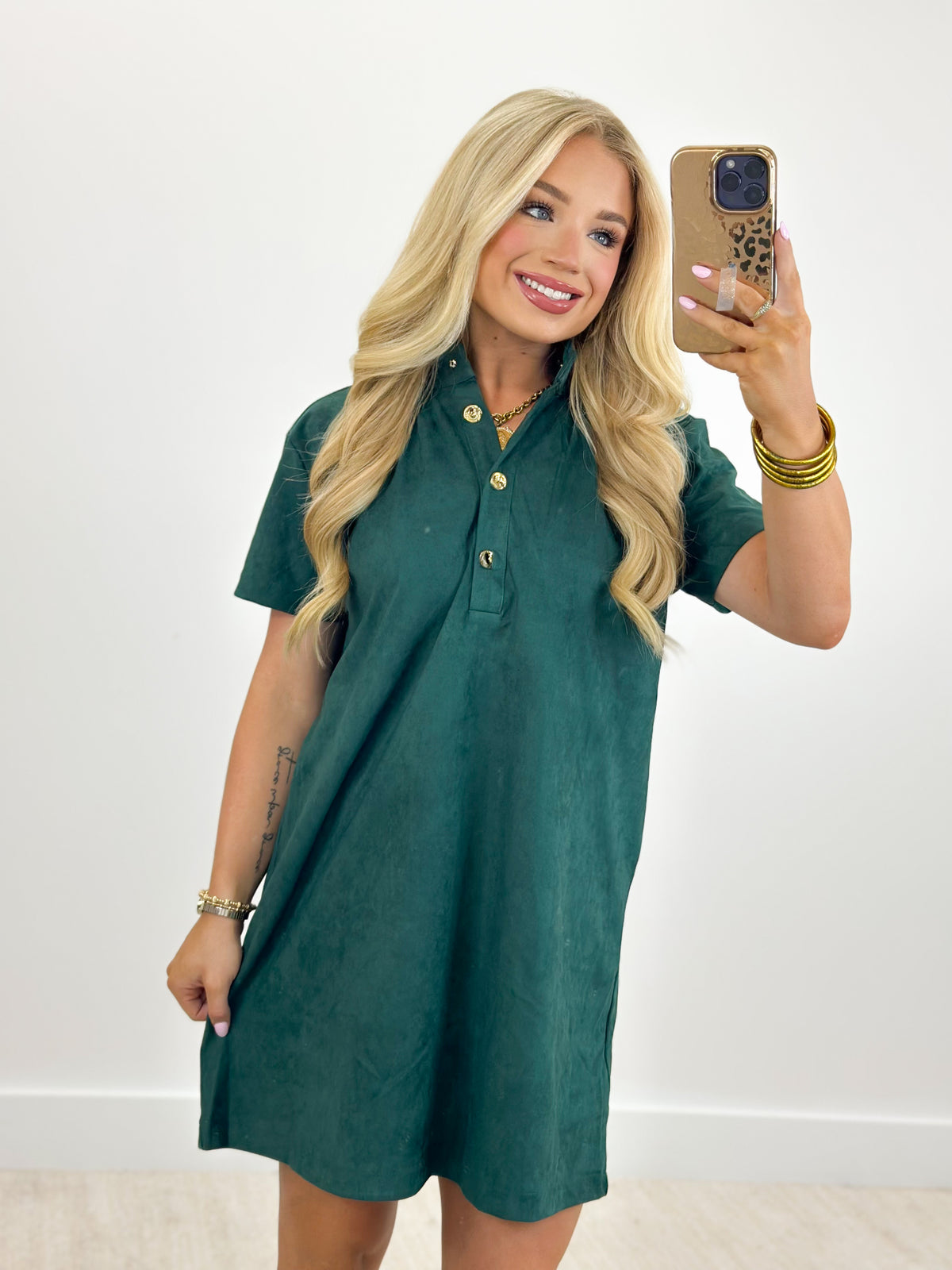 Hunter green mini dress with a stand collar, short sleeves, and gold-tone buttons