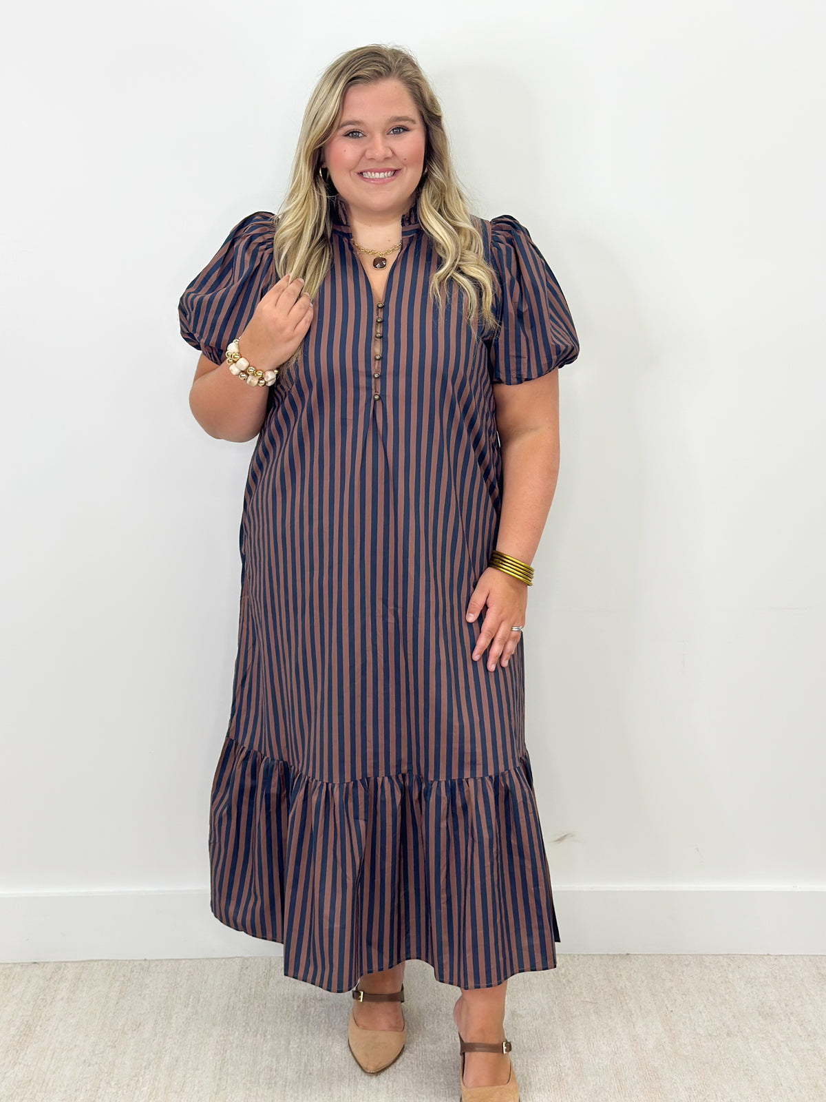 Striped midi dress with ruffle neck, short puff sleeves, and tiered skirt