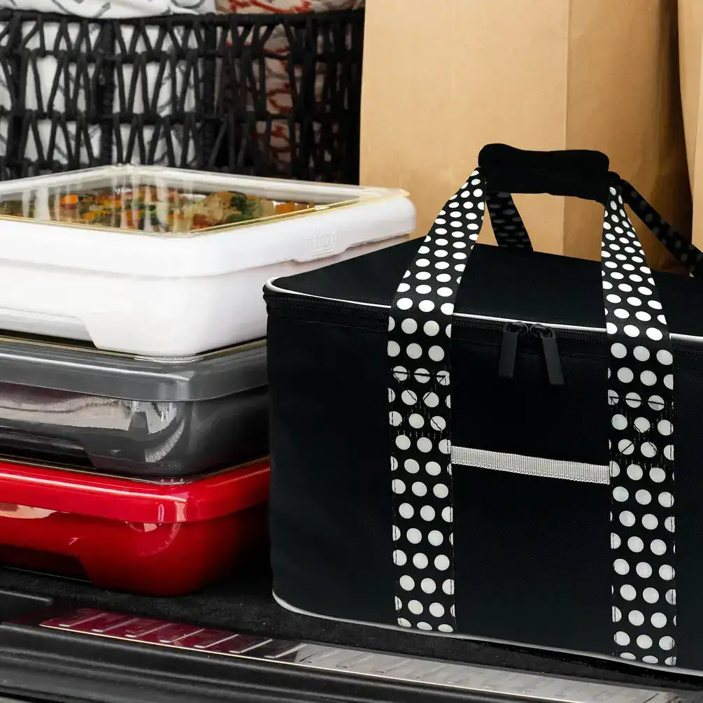 Black insulated tote with polka-dot shoulder straps and front drawstring pocket