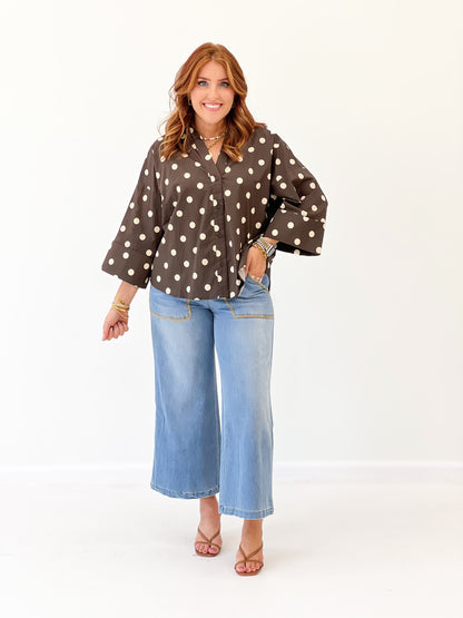 Espresso polka dot button-down top with long flared sleeves and collar