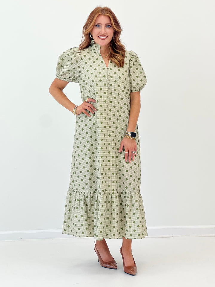 Olive polka dot long maxi dress with V-neck and short puff sleeves, tiered ruffle hem