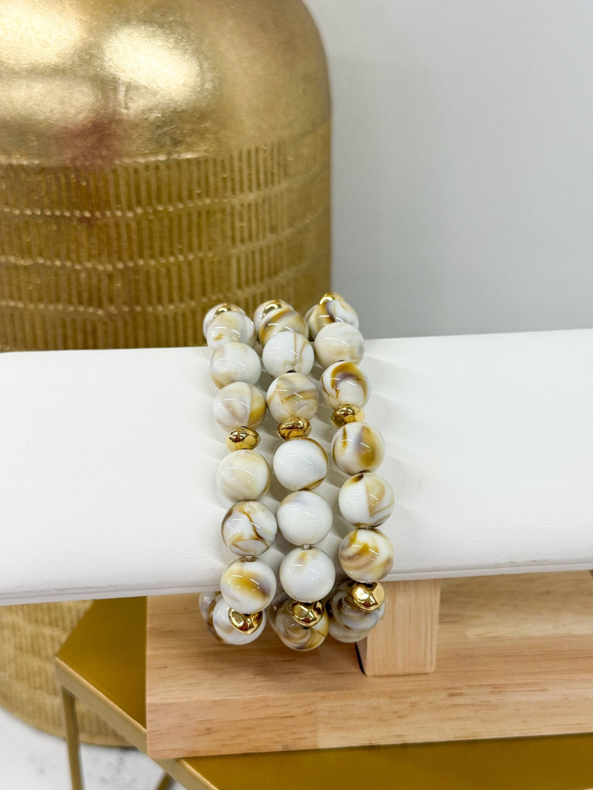 Three rows of smooth ball beads on a bracelet