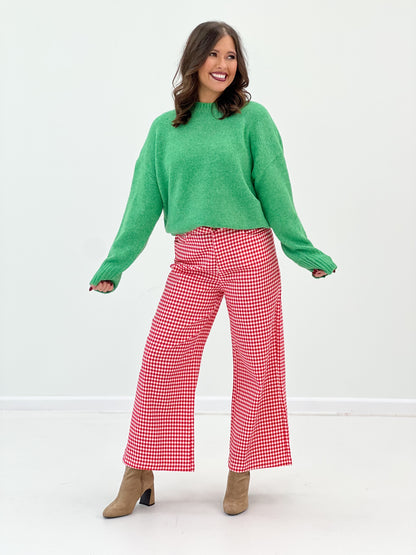 Green ribbed crew neck sweater with ribbed neckline and cuffs