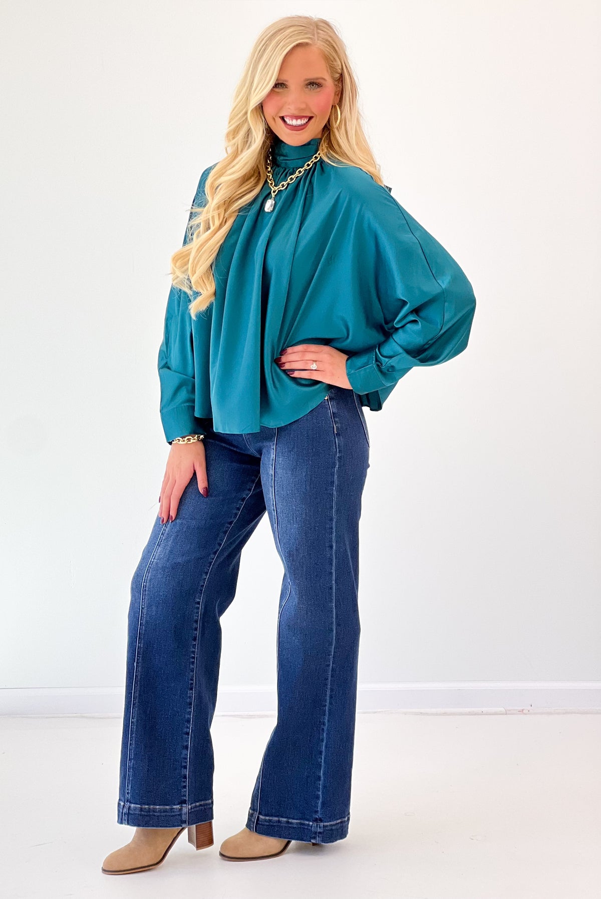 Teal satin-effect tie-back blouse with long sleeves and high gathered neckline