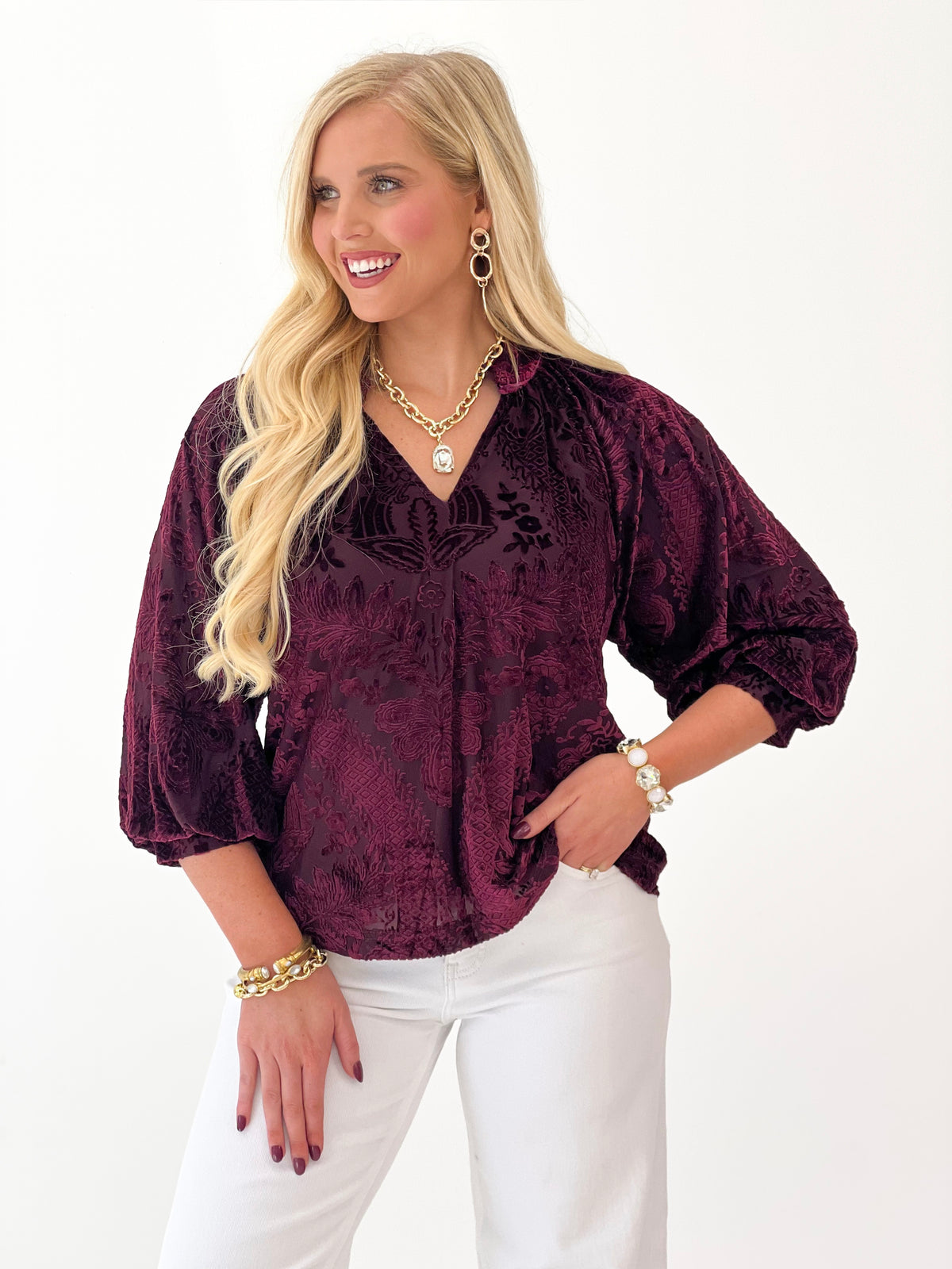 Merlot damask velvet split-neck top with textured abstract pattern