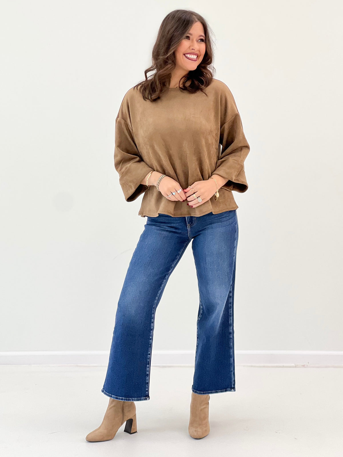 Mocha suede-look blouse with roomy wide sleeves, rounded neckline, and cuffed hem