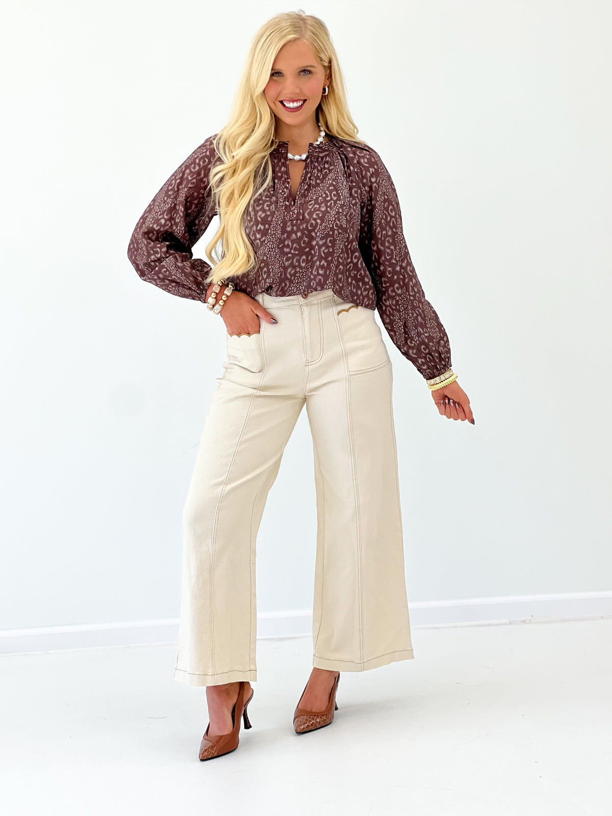 Brown printed V-neck long-sleeve top with long sleeves and relaxed fit