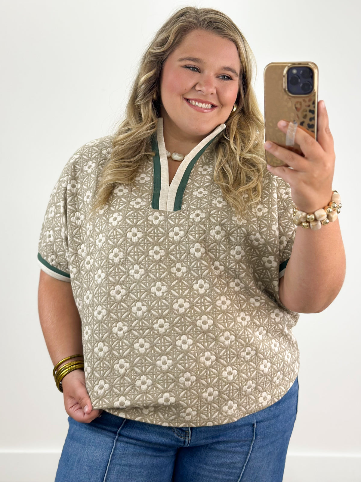 Taupe jacquard pullover top with white contrast V-neck and short sleeves