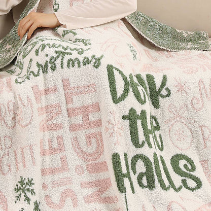 Cream throw blanket with pink and green Holly Jolly print