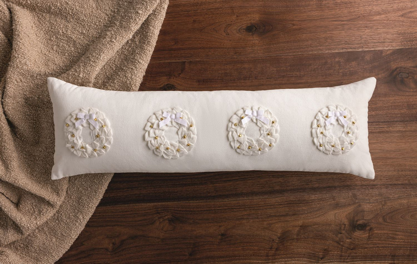 MudPie Jingle Wreath Long Pillow styled