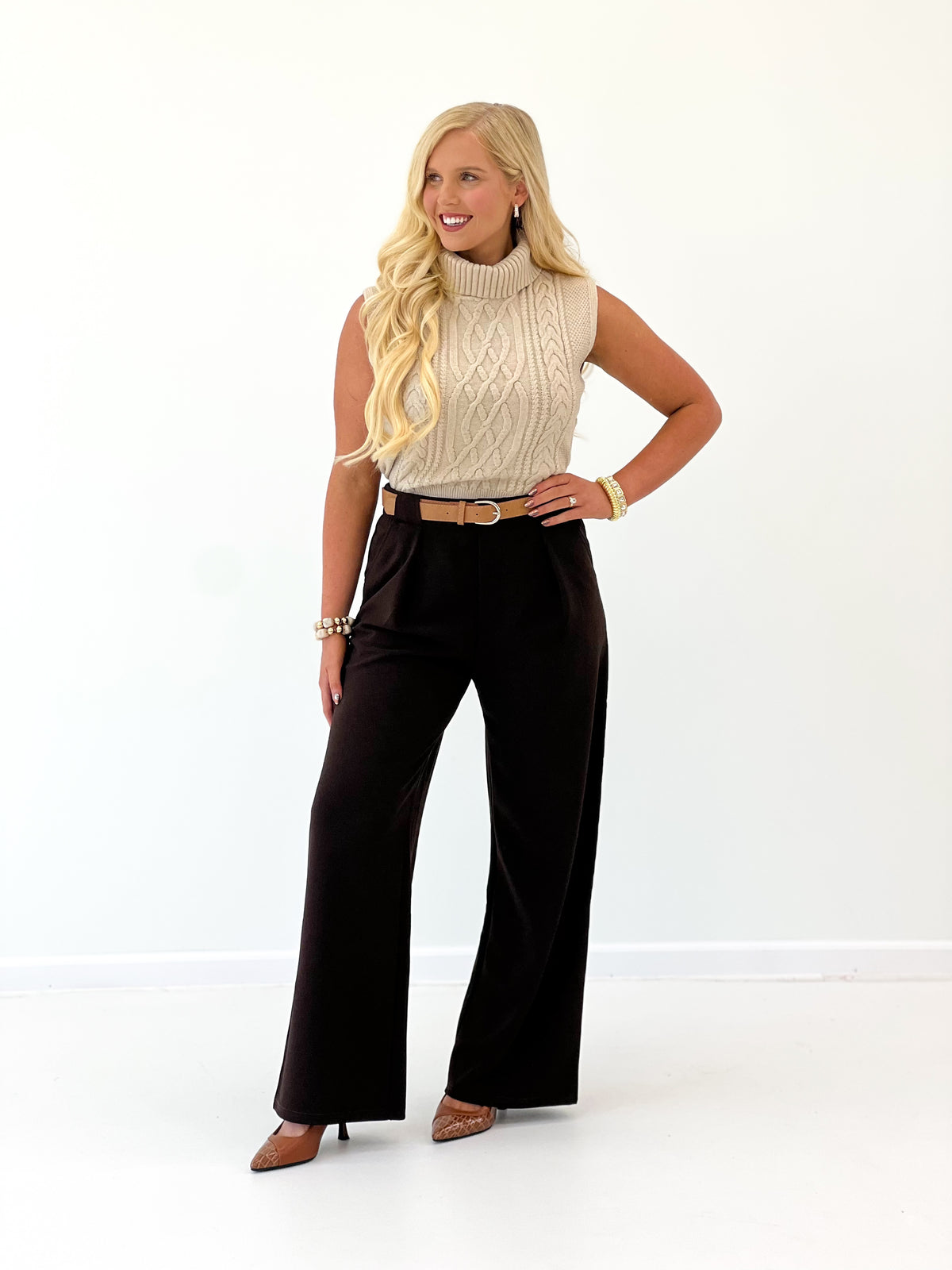 Ivory cap-sleeve turtleneck cable knit sweater top, sleeveless knit texture