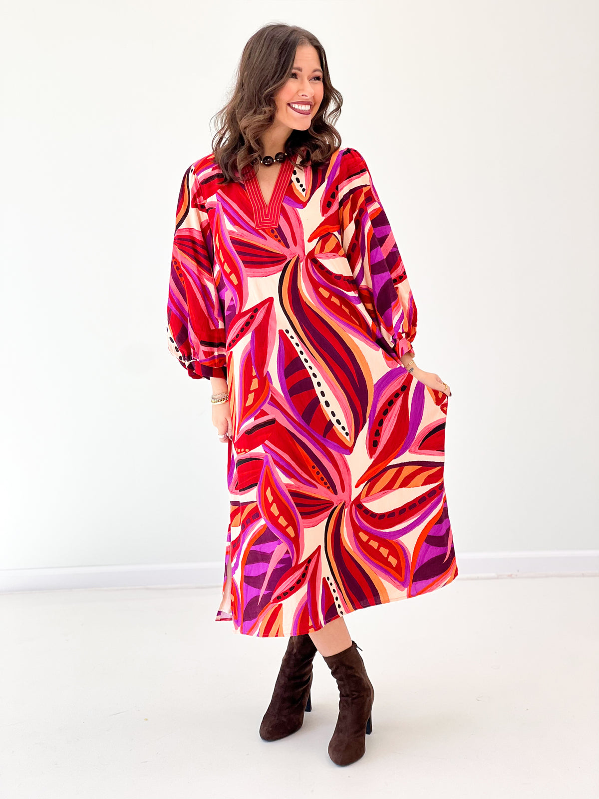 Red boho midi dress with V-neck, puff sleeves, abstract print and knee-length hem