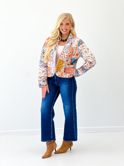 Quilted kimono-style jacket in multicolor print with open front and long sleeves