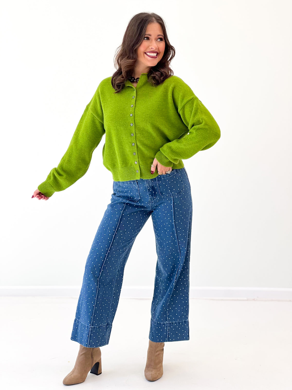 Pea green button-front sweater with fold-over collar and long sleeves