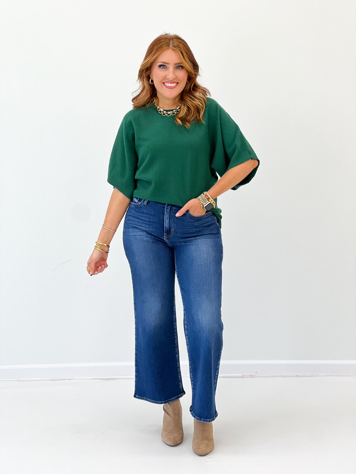 Forest green dolman elbow-sleeve sweater with relaxed fit and ribbed cuffs