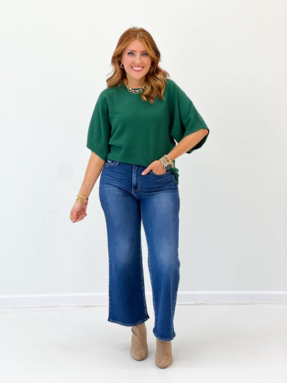 Forest green dolman elbow-sleeve sweater with relaxed fit and ribbed cuffs