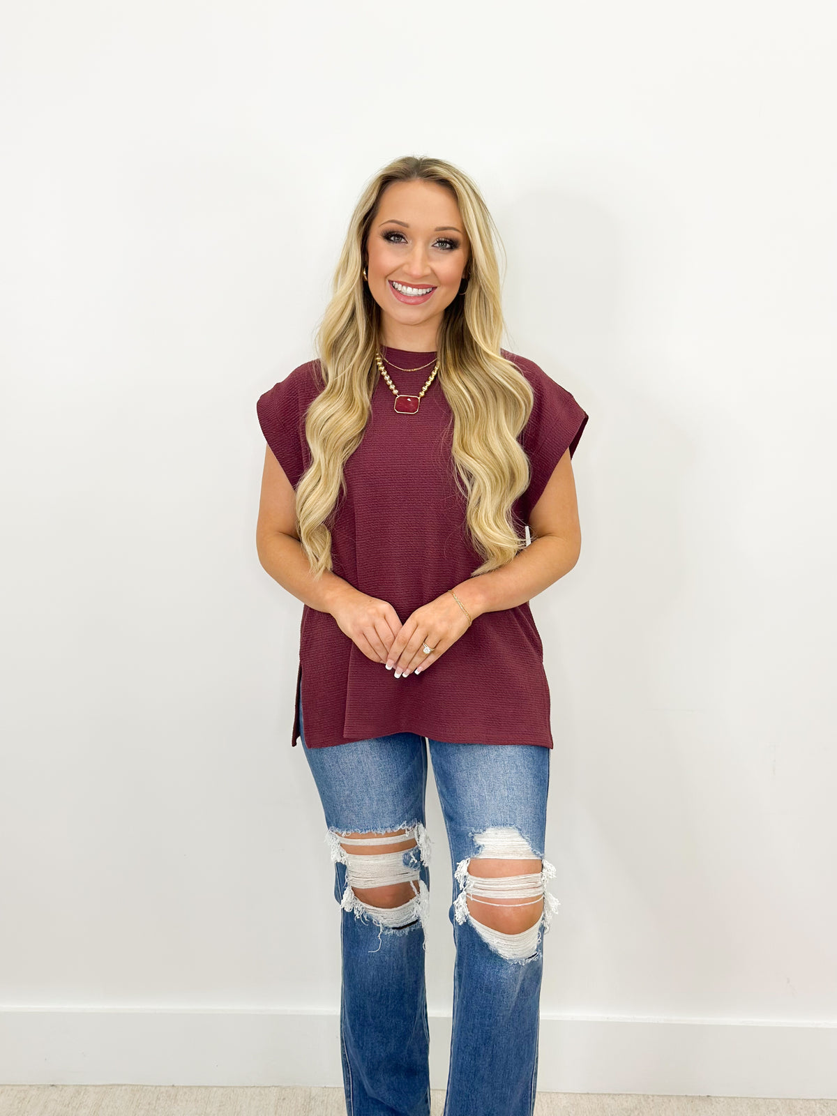 Tres Bien Round Neck Sleeveless Knit Top