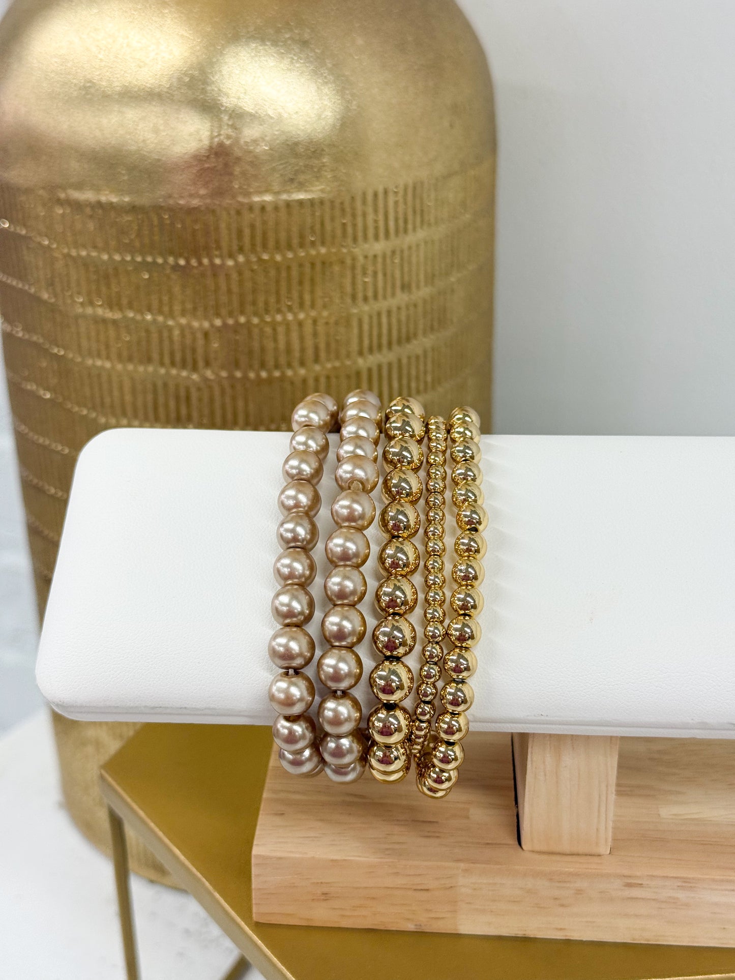 Gold-toned 5-row pearl and bead bracelet with stacked round strands
