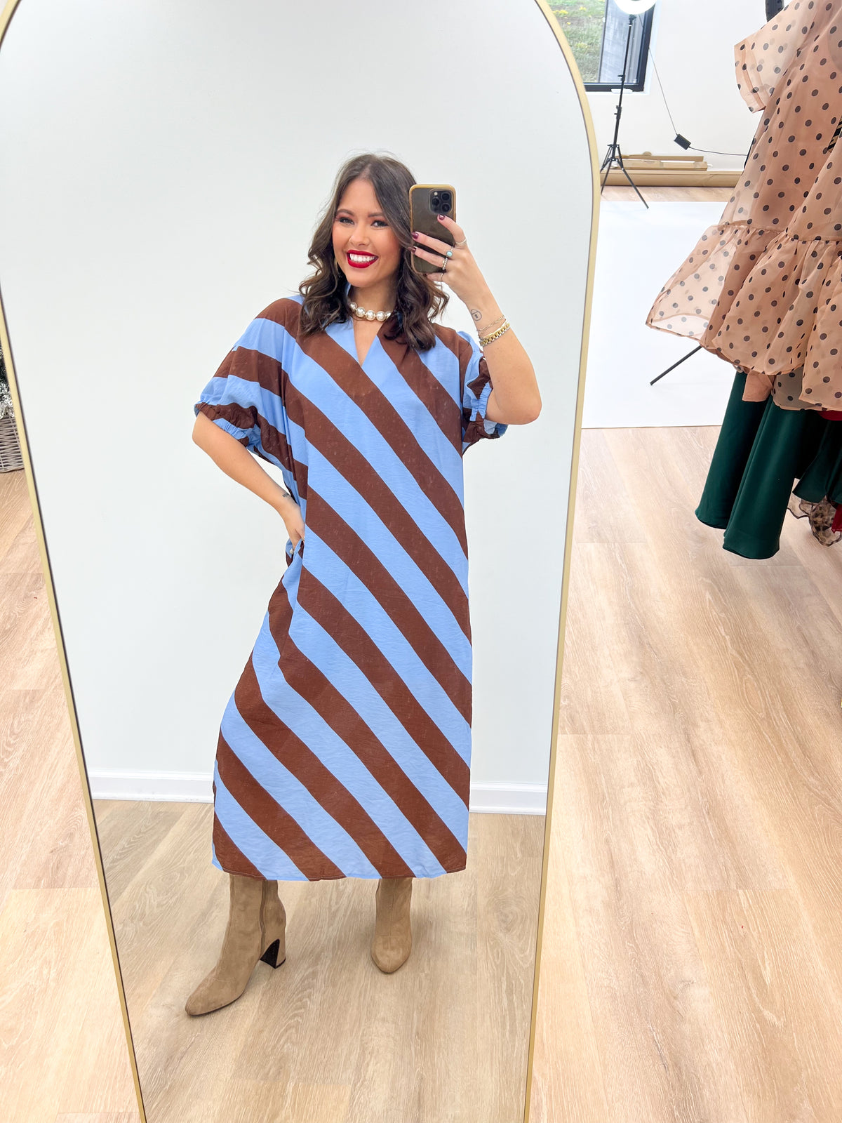 Light blue and rust striped dolman sleeve V-neck midi dress, side view